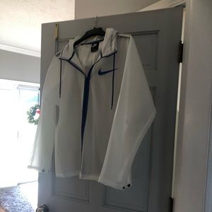 Nike Jacket.  Size Mens Medium.  Clear- blue Trimming.  Worn 1x. Like New
